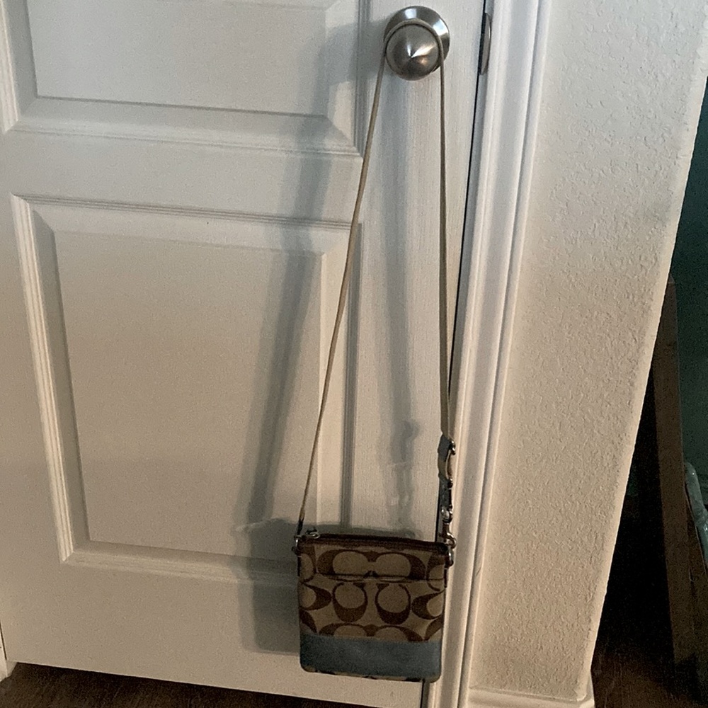 Cute authentic Coach cross body 2 tone with coach brown monogram and blue.